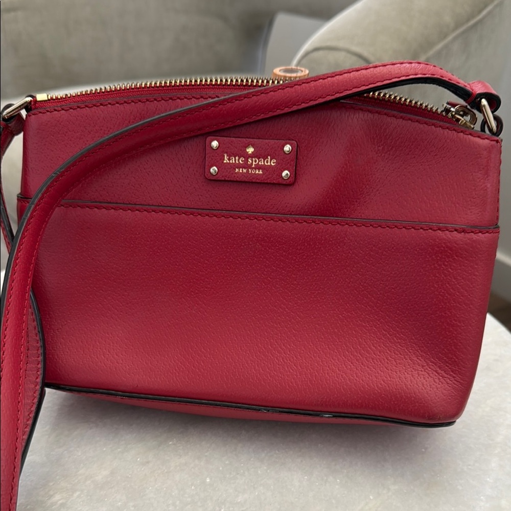 Kate Spade Red Crossbody Bag with Structured Design